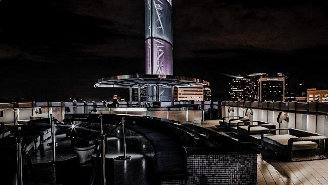 A sleek view of the Sky Lounge in Downtown Orlando with unreal views of the beautiful SKYLINE