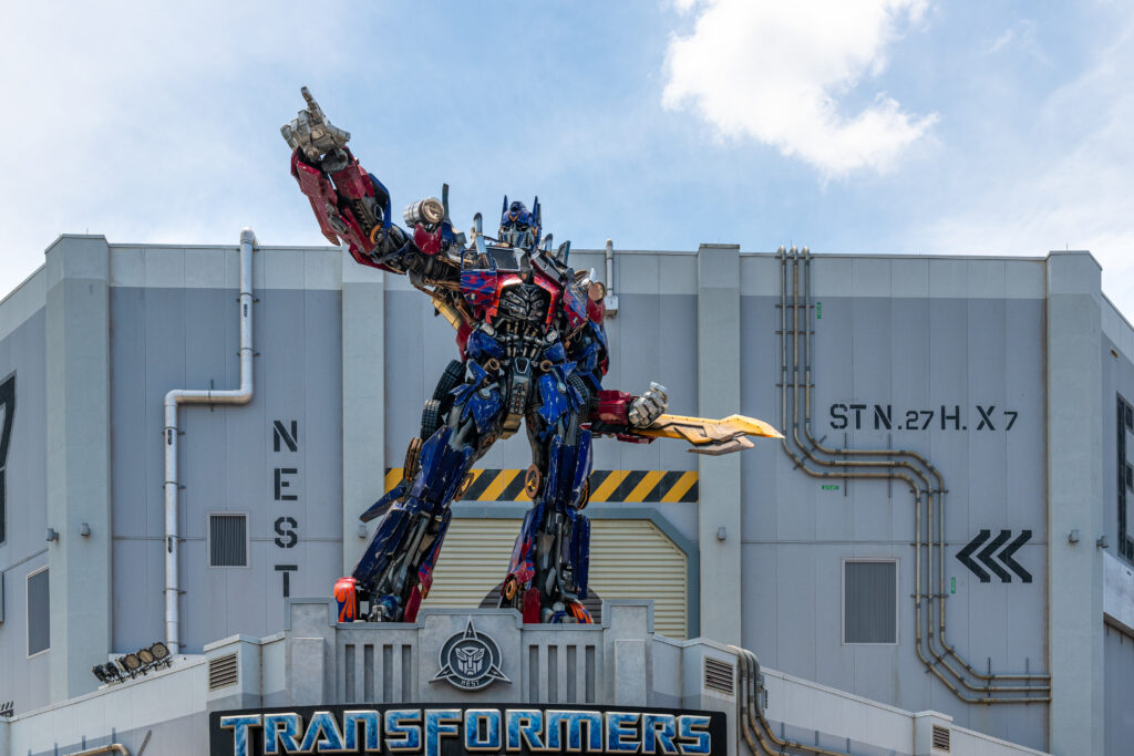 A Transformers statue decorating the ride entrance at the Universal Studios Florida which is a famous place and a tourist attraction.