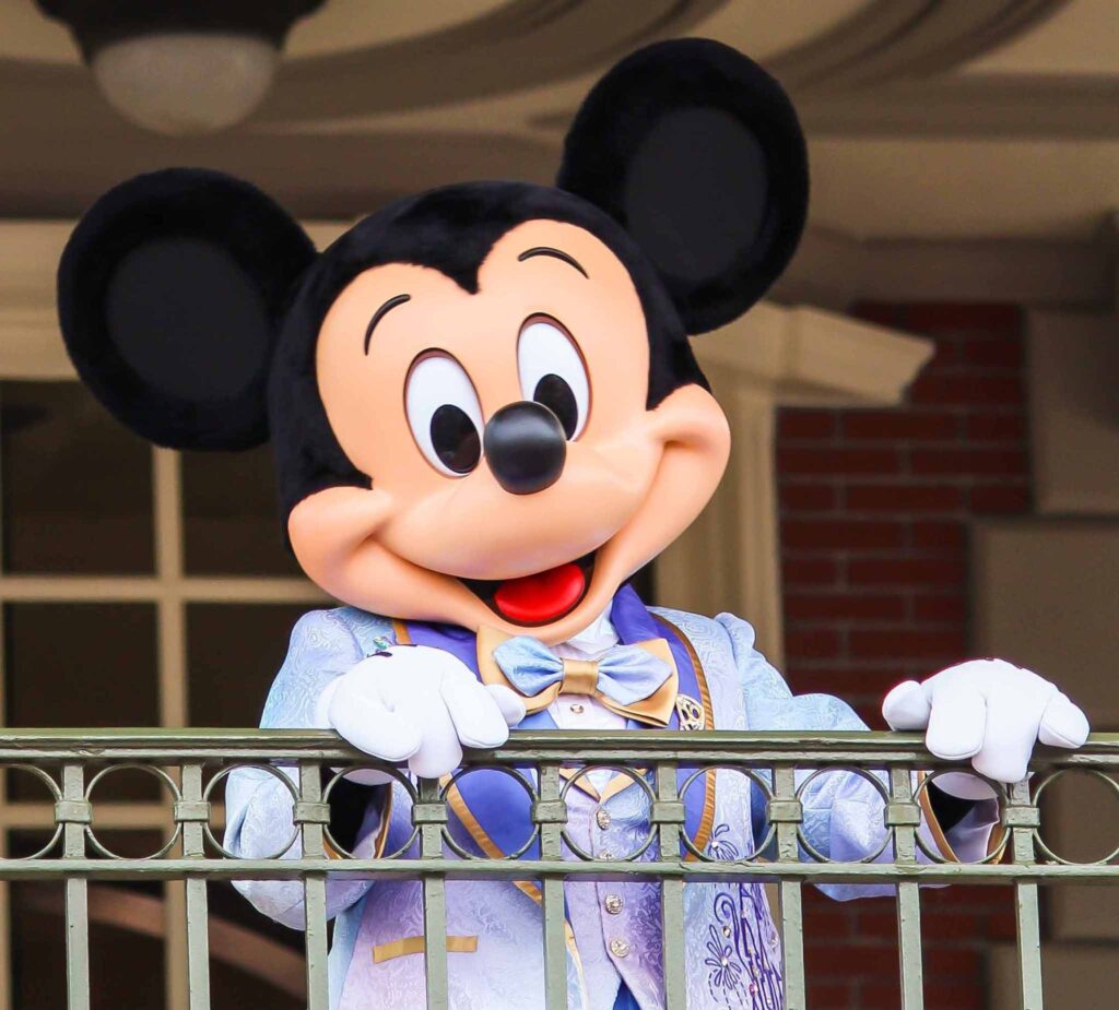 Mickey Mouse at Magic Kingdom greeting guests
